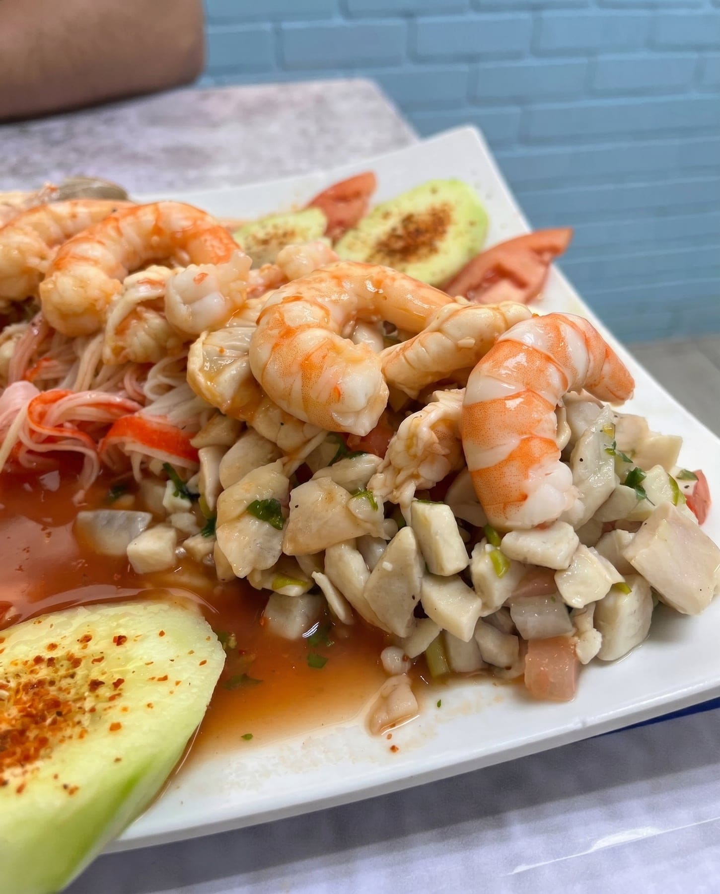 Camarones aguachiles — shrimp in aguachile with cucumber and avocado