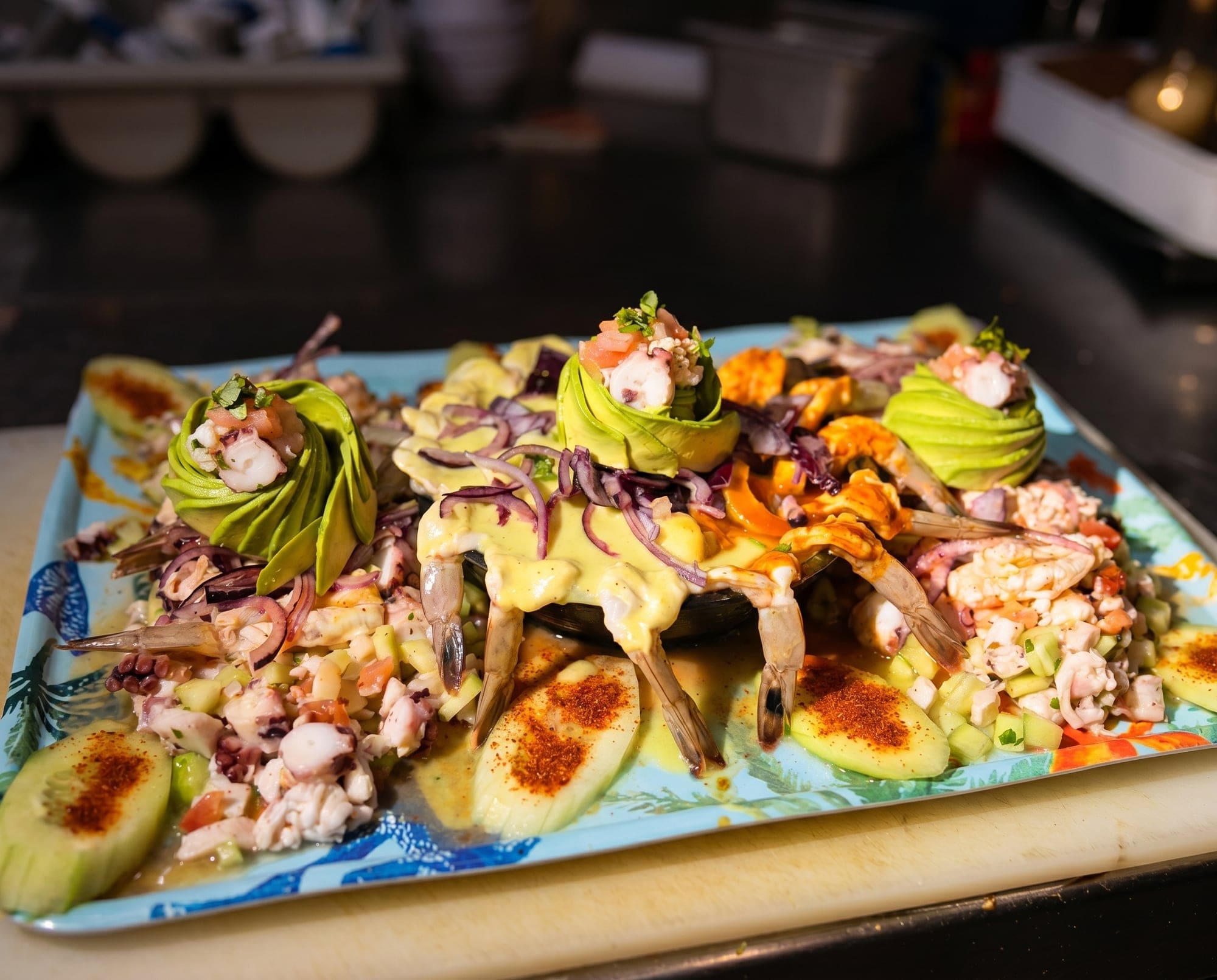 Mariscada El Pirata — Toritos, sinaloenses, shrimp quesadilla, chicharrón de pescado, breaded fish and shrimp, two ceviches, octopus, crab, oysters and camarones ahogados — one platter, the whole crew fed.