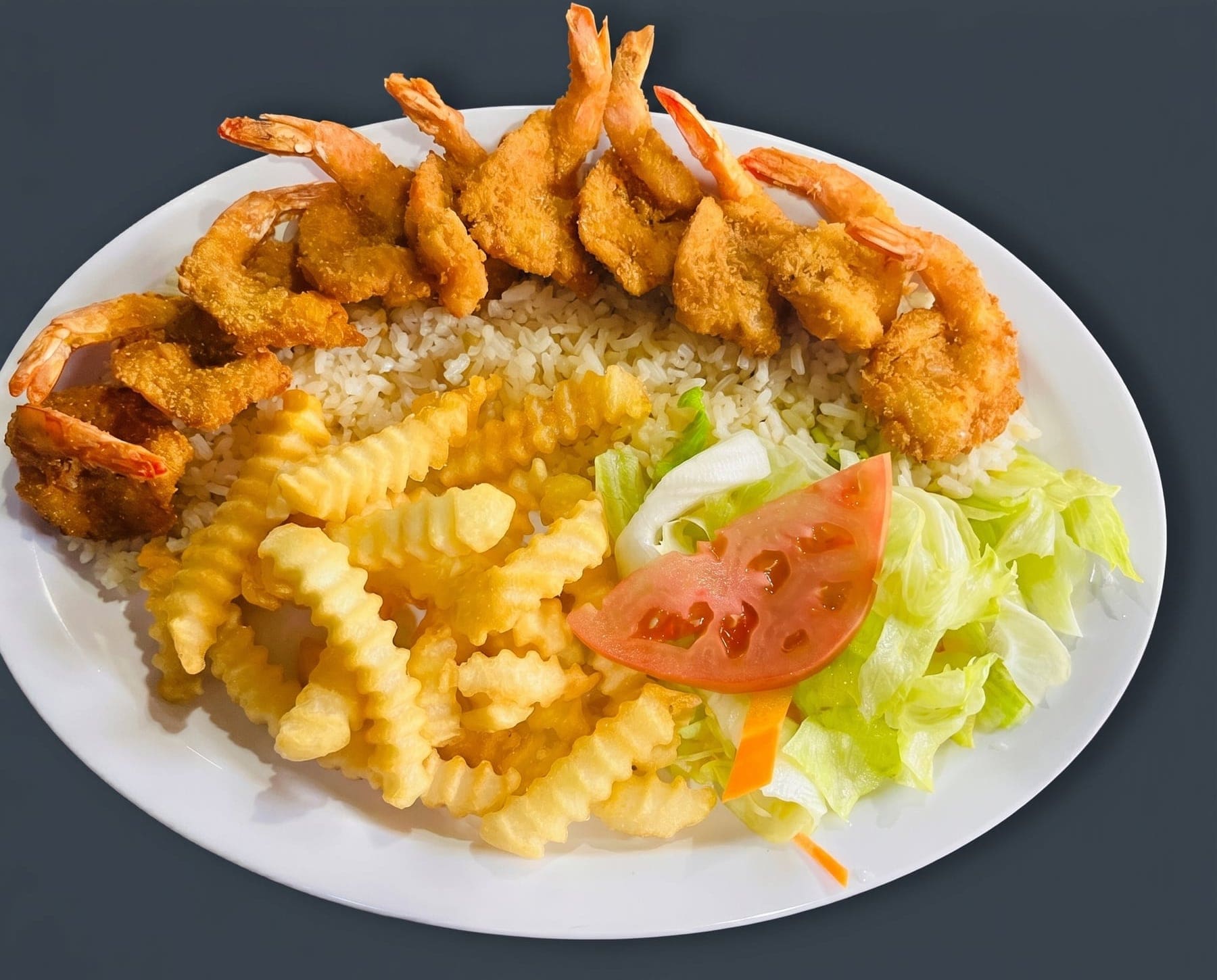 Breaded shrimp with crinkle fries
