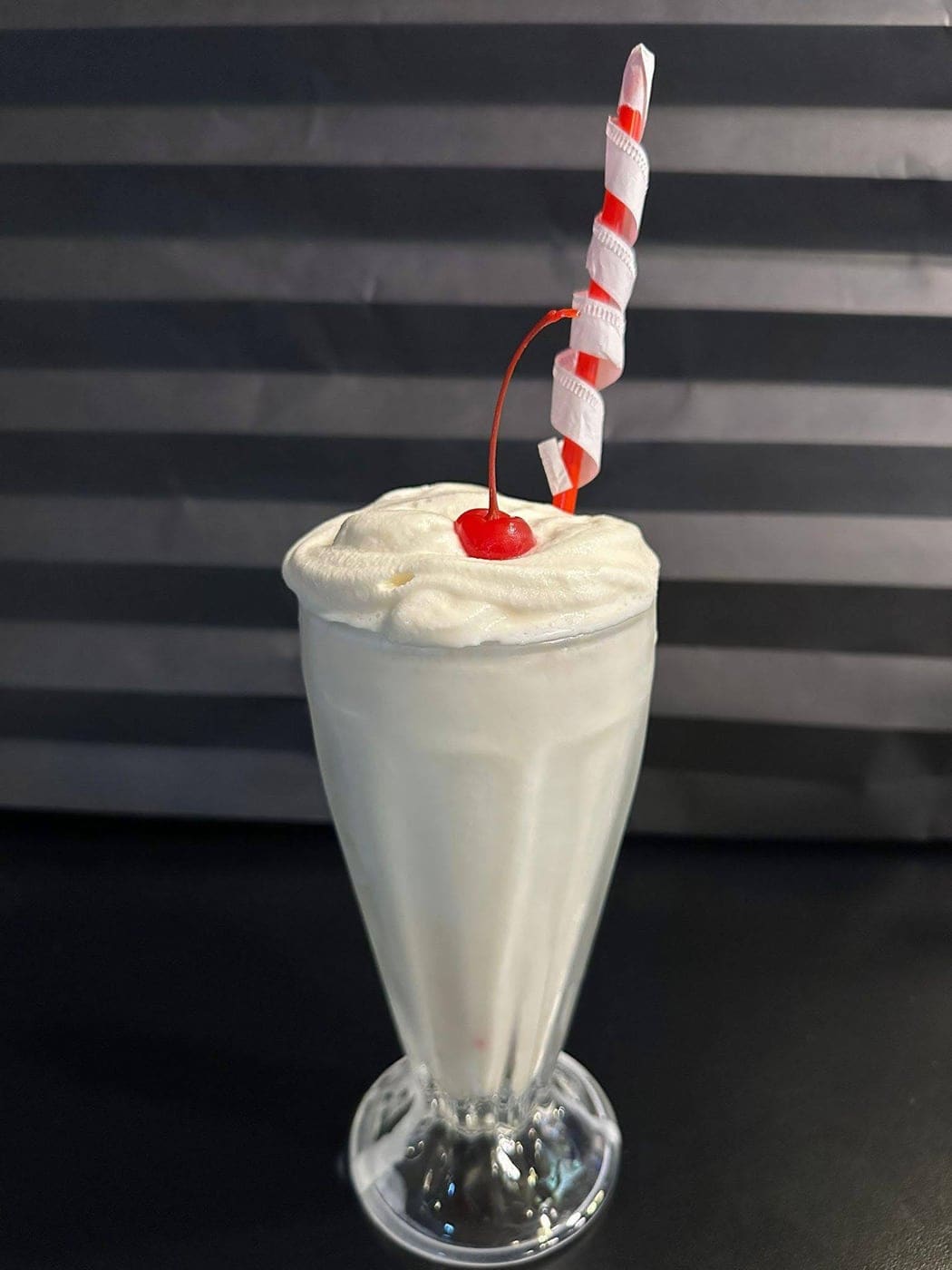 Piña colada with cherry